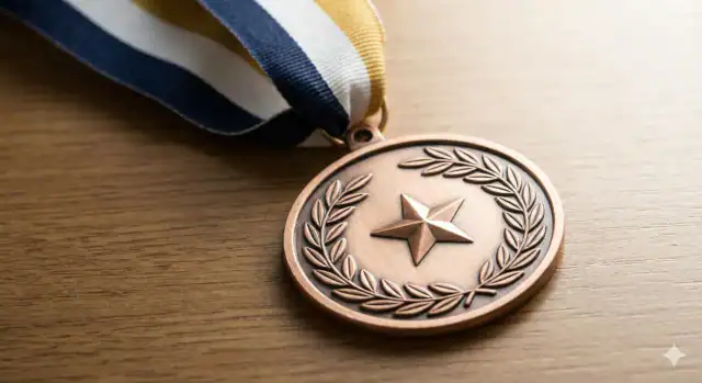 Award Metal with red white and blue ribbon